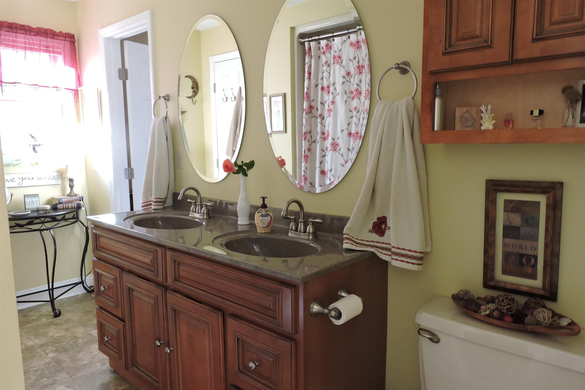 826 Wayside Road Manchester, TN 37355 - Photo 16 of 31 a bathroom with a sink and a mirror