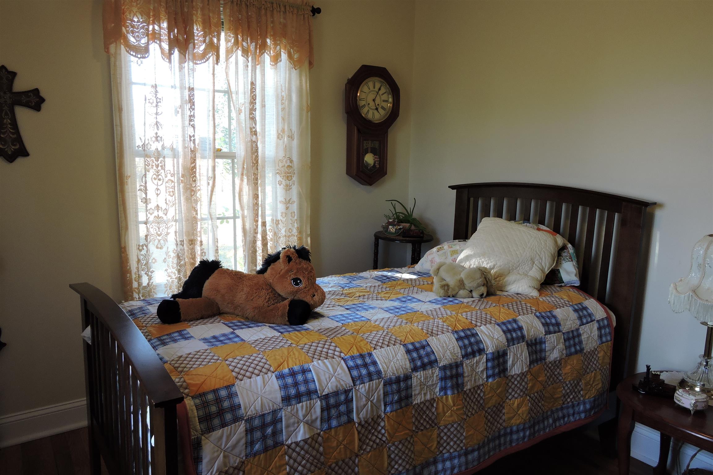826 Wayside Road Manchester, TN 37355 - Photo 18 of 31 a bedroom with a bed a window and wall painting