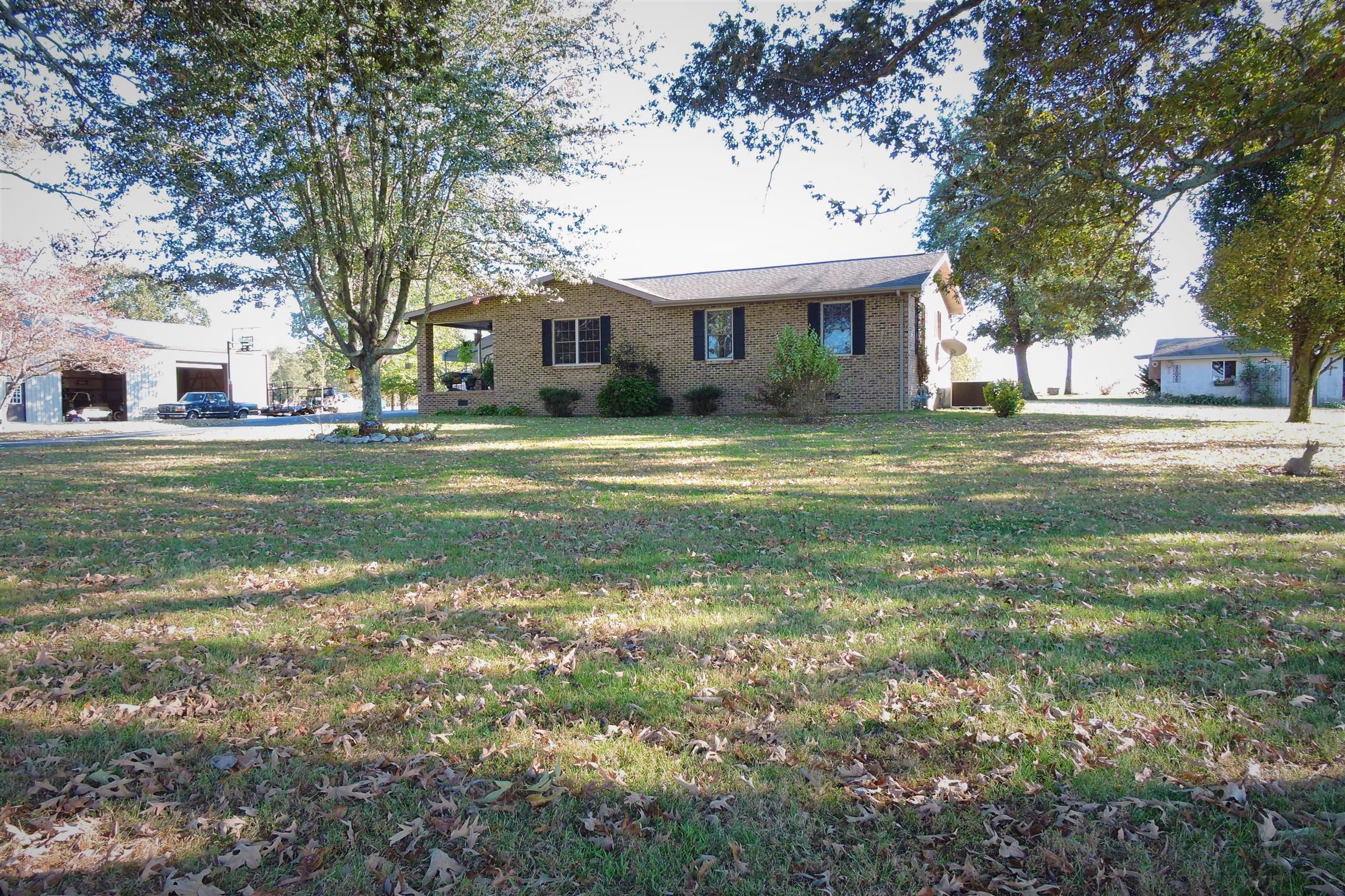 826 Wayside Road Manchester, TN 37355 - Photo 2 of 31 a front view of a house with a garden