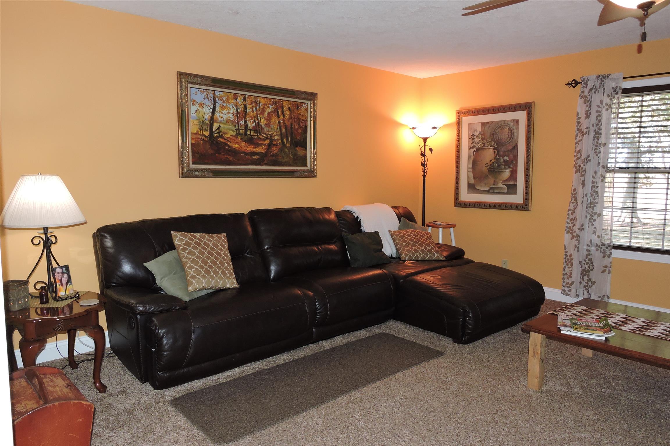 826 Wayside Road Manchester, TN 37355 - Photo 7 of 31 a living room with furniture a lamp and a window