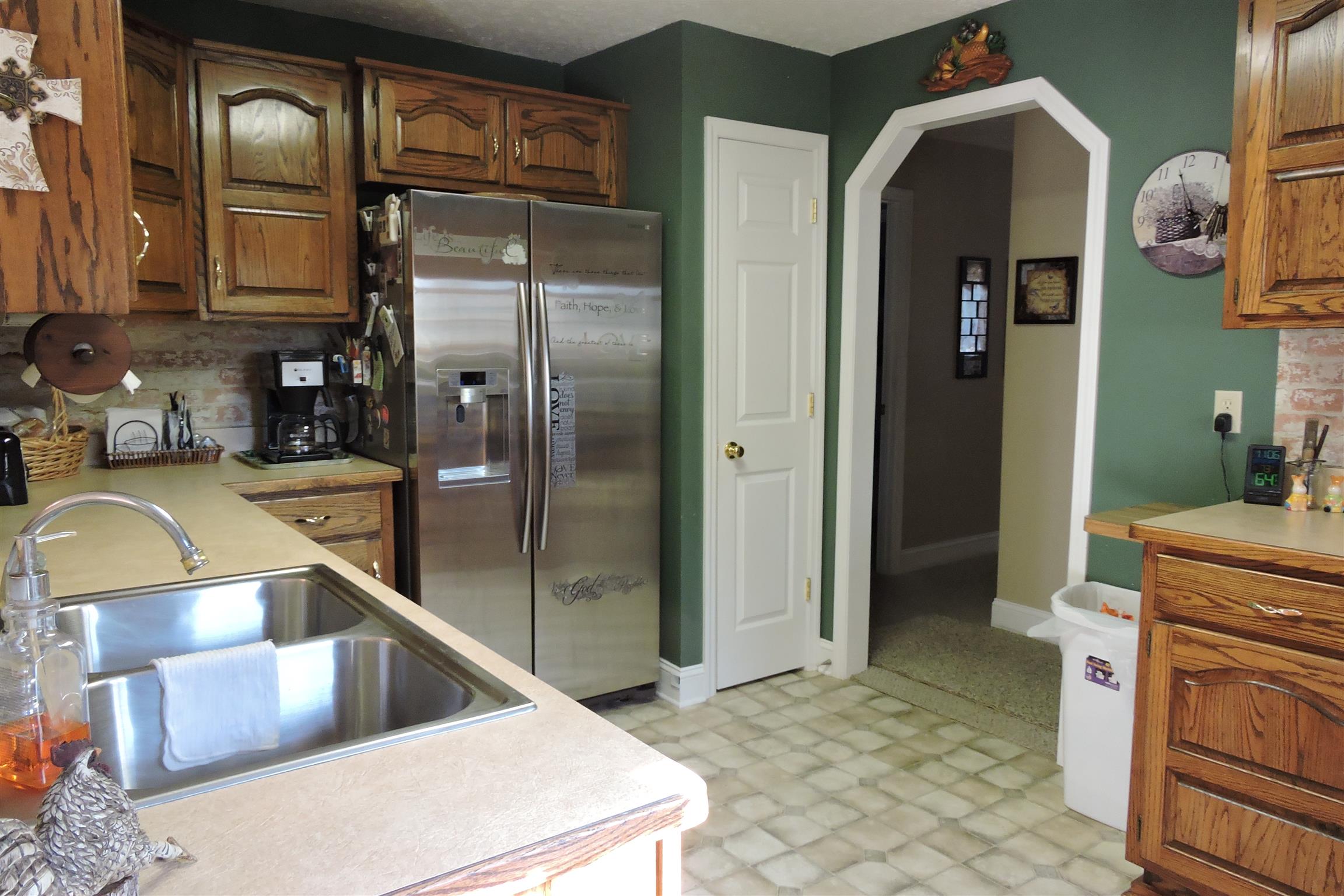 826 Wayside Road Manchester, TN 37355 - Photo 10 of 31 a kitchen with stainless steel appliances granite countertop a refrigerator and a sink