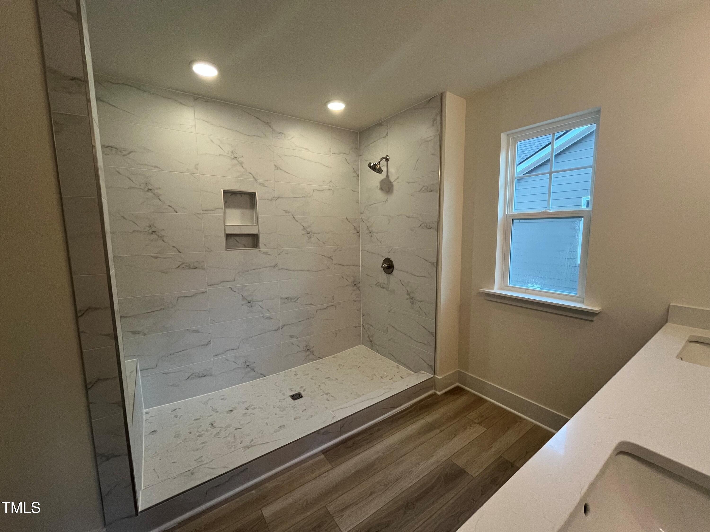766 Old Station Pointe Angier, NC 27501 - Photo 22 of 40 a bathroom with a shower