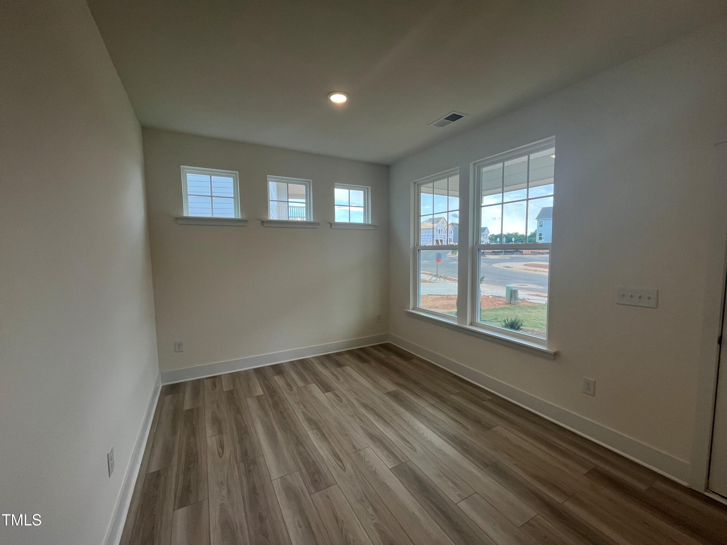 766 Old Station Pointe Angier, NC 27501 - Photo 8 of 40 a view of an empty room and window