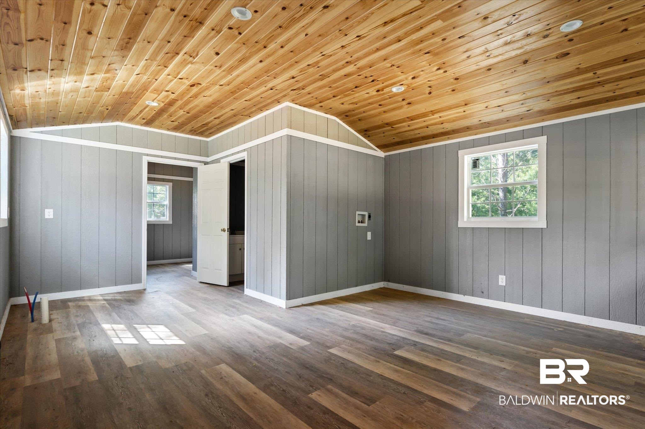 15685 Louis Cooper Road Bay Minette, AL 36507 - Photo 23 of 26 Unfurnished room with vaulted ceiling, wooden ceiling, and hardwood / wood-style floors