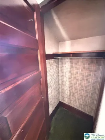 a bathroom with a tub and shower