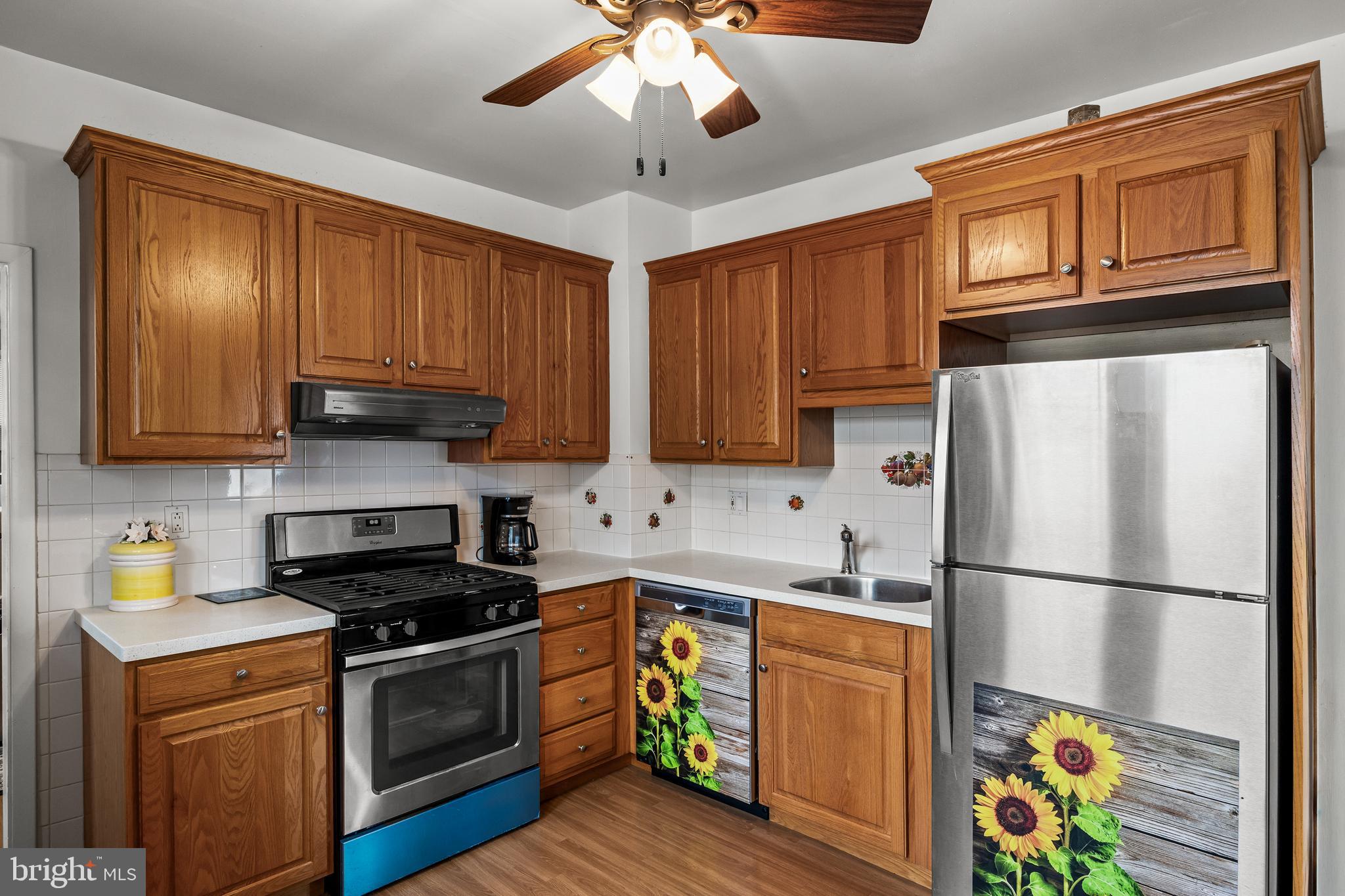 304 South Forklanding Road Maple Shade, NJ 08052 - Photo 10 of 29 a kitchen with stainless steel appliances granite countertop a refrigerator stove microwave and sink