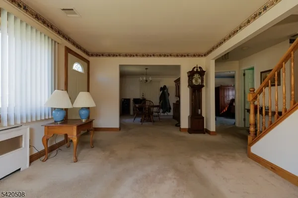 a view of a livingroom with furniture and an furniture