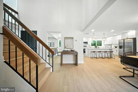 a view of living room with furniture and flat screen tv