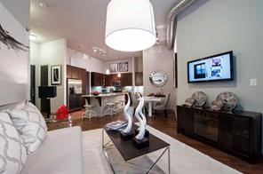 2525 McCue Road, Unit 553 Houston, TX 77056 - Photo 15 of 16 a view of a dining room with furniture