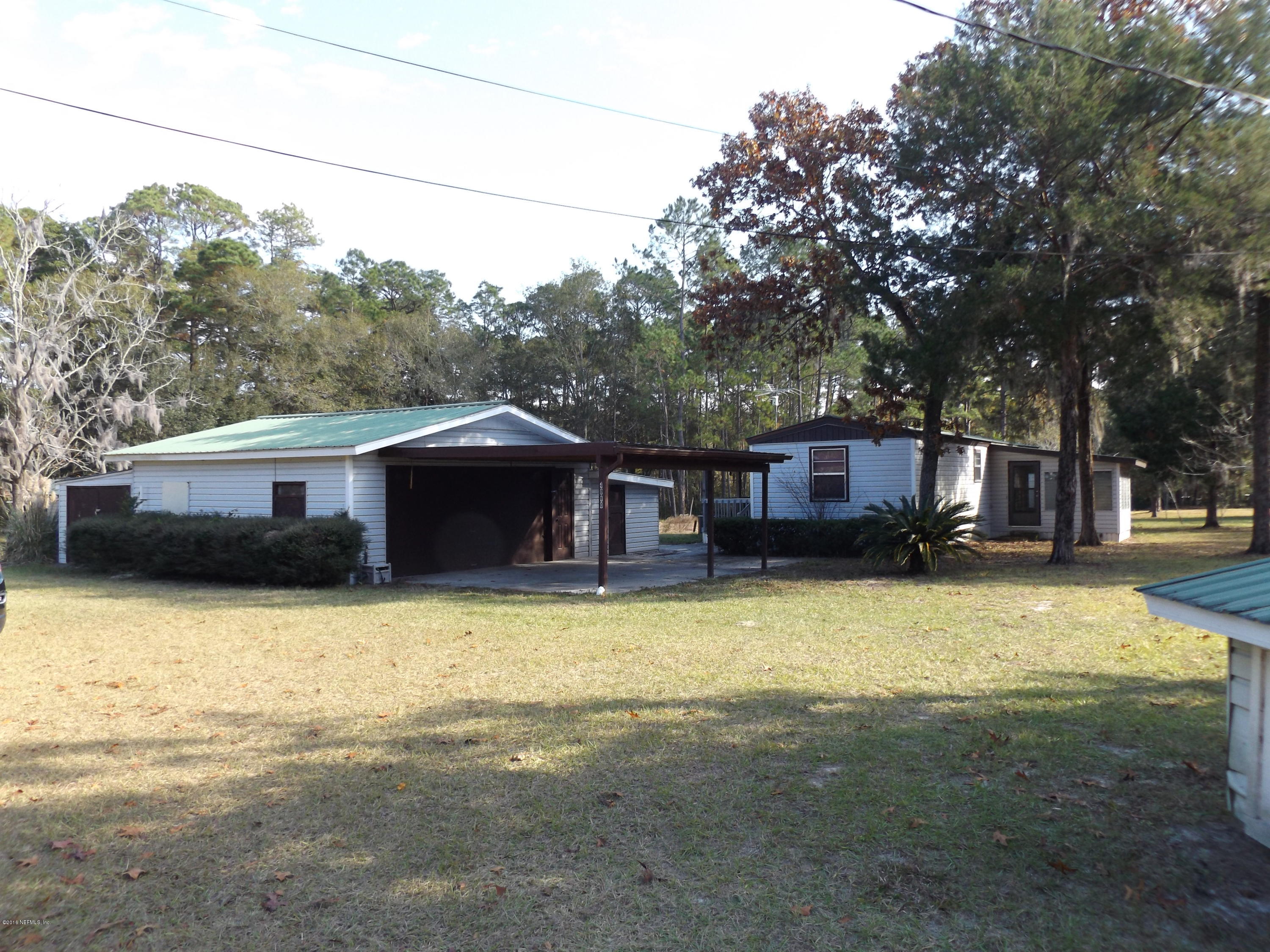 4010 Mustang Road Middleburg, FL 32068 - Photo 12 of 16 a swimming pool view with a seating space
