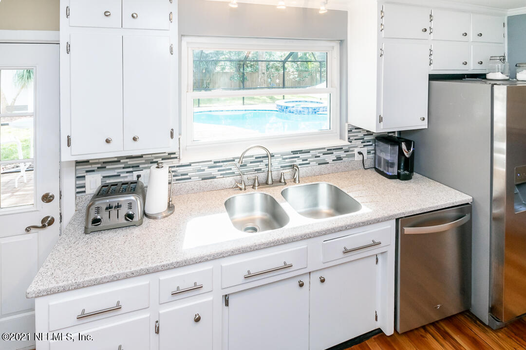 1500 Big Tree Road Neptune Beach, FL 32266 - Photo 5 of 32 Kitchen Window overlooking pool