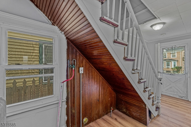 403 Seminary Avenue Rahway, NJ 07065 - Photo 12 of 29 a view of a stairs and an entryway