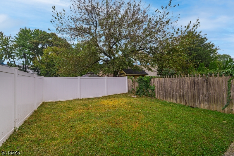 403 Seminary Avenue Rahway, NJ 07065 - Photo 28 of 29 a view of backyard with green space