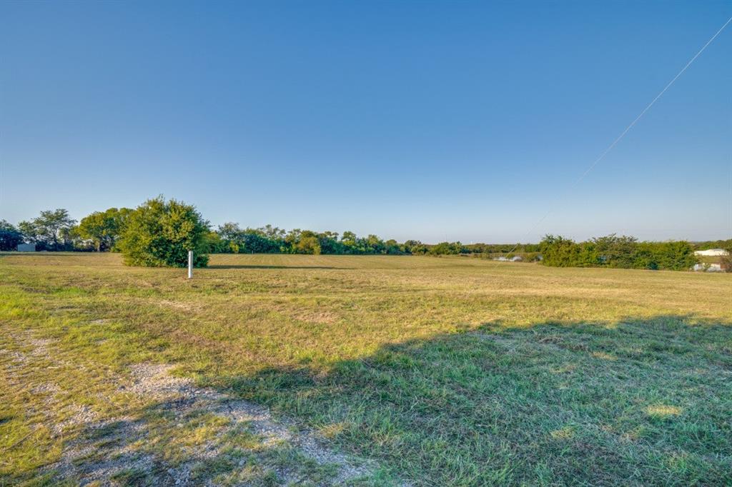 18760 Cr 913 Road Nevada, TX 75173 - Photo 12 of 13 a view of a lake with houses in the back