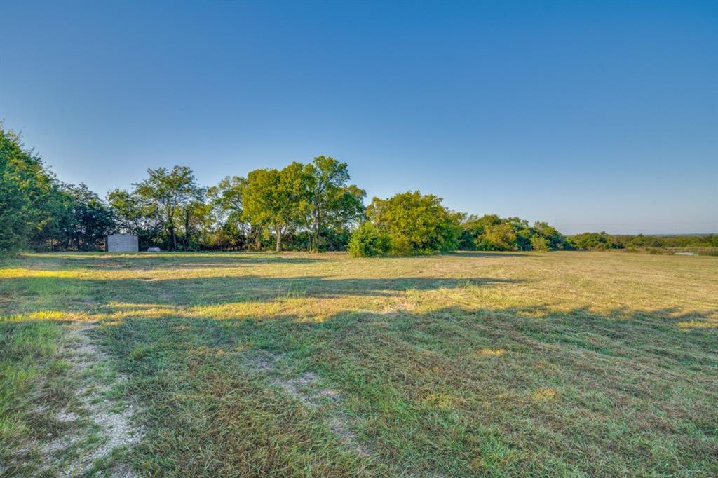 18760 Cr 913 Road Nevada, TX 75173 - Photo 2 of 13 a view of a swimming pool and an outdoor space