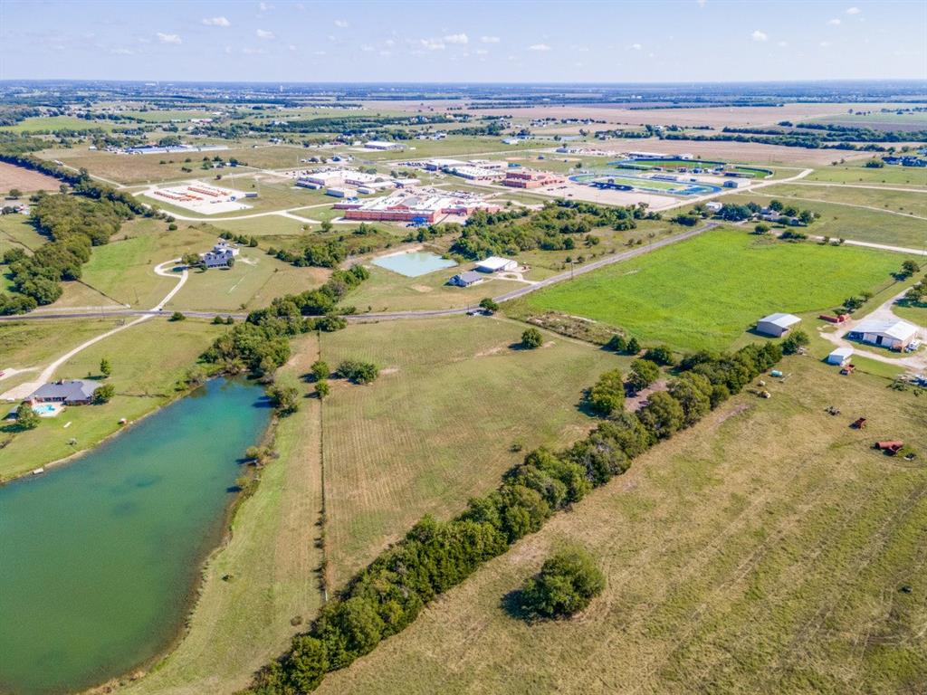 18760 Cr 913 Road Nevada, TX 75173 - Photo 6 of 13 a view of a city with an ocean