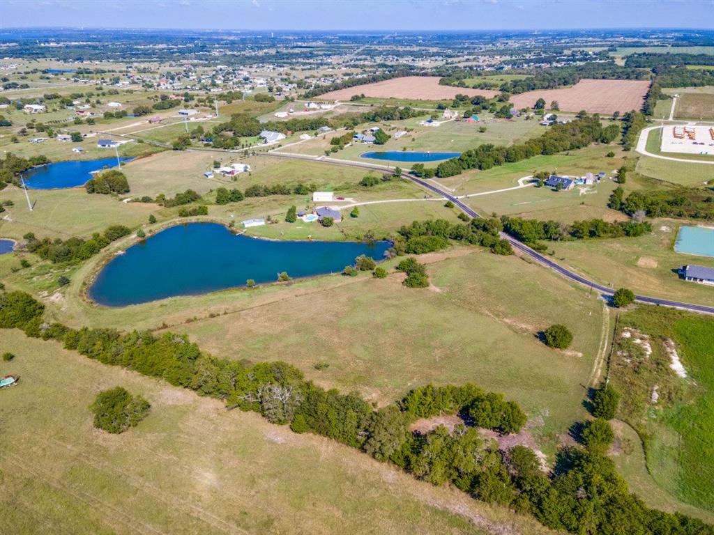 18760 Cr 913 Road Nevada, TX 75173 - Photo 8 of 13 an aerial view of residential houses with outdoor space