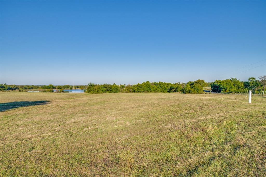 18760 Cr 913 Road Nevada, TX 75173 - Photo 9 of 13 a view of an ocean from a yard