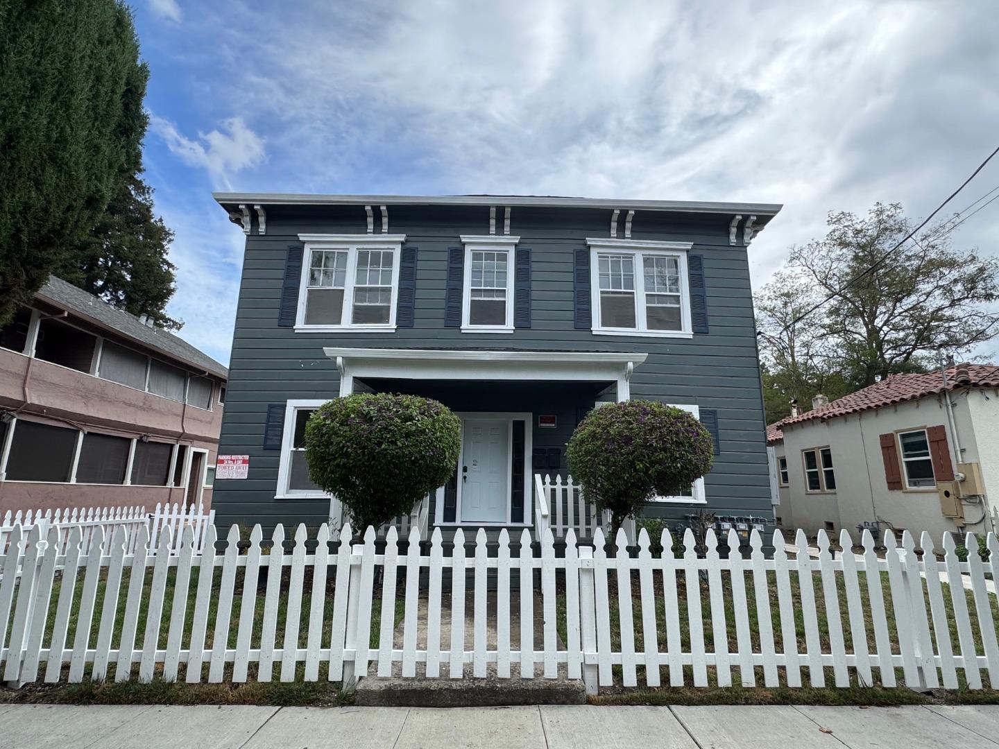 a front view of house yard and deck