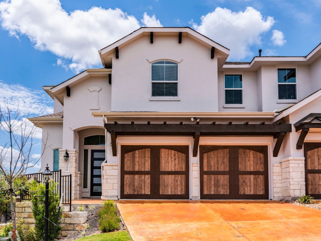 a view of a house with a swimming pool