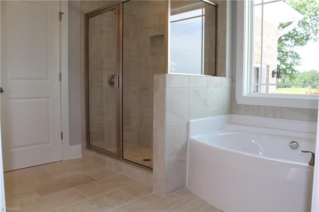 2621 Lunsford Road Summerfield, NC 27358 - Photo 12 of 30 Separate shower and soaking tub