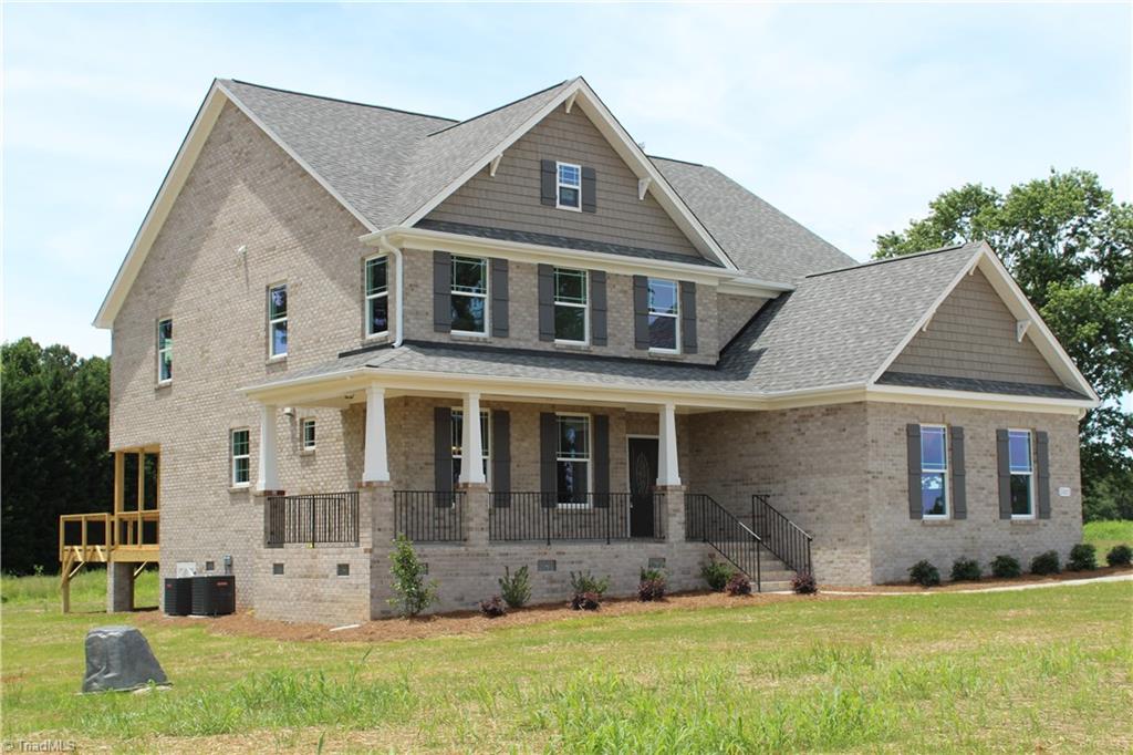 2621 Lunsford Road Summerfield, NC 27358 - Photo 3 of 30 Four sided brick home with vinyl accents