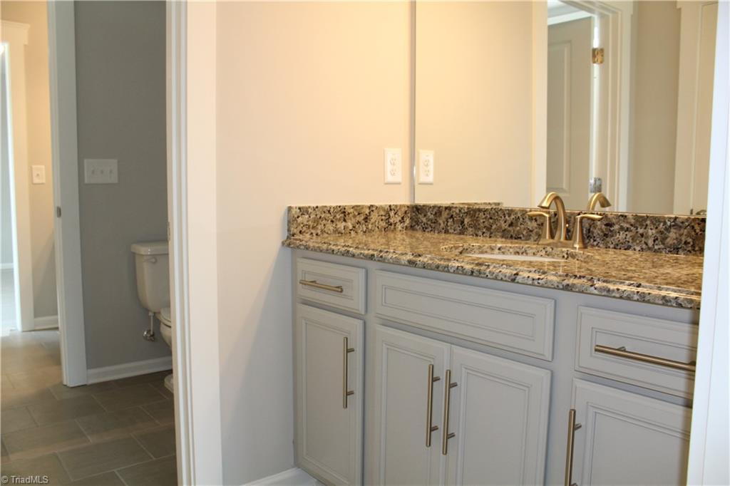 2621 Lunsford Road Summerfield, NC 27358 - Photo 22 of 30 Buddy Bathroom with upgraded granite countertops