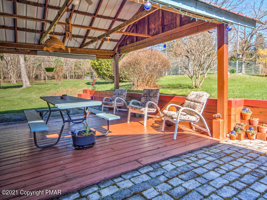259 Babbling Brook Road Scotrun, PA 18355 - Photo 24 of 63 a outdoor space with chairs