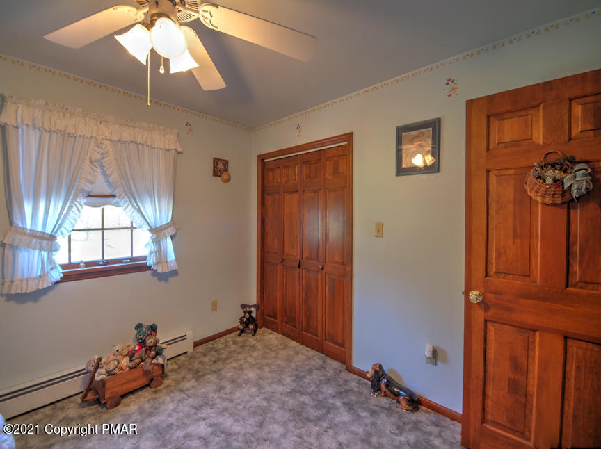 259 Babbling Brook Road Scotrun, PA 18355 - Photo 43 of 63 a view of a livingroom with furniture and windows