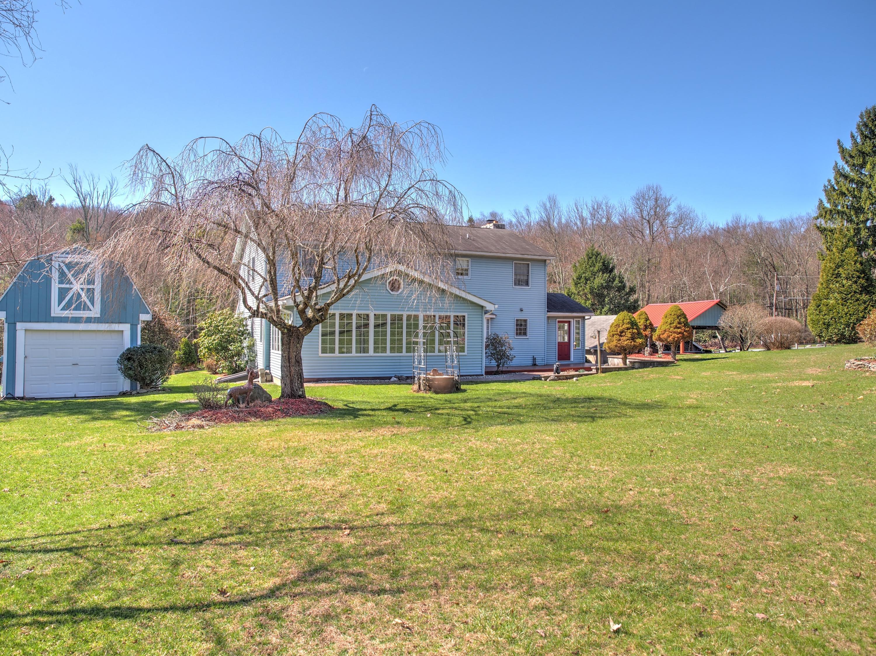 259 Babbling Brook Road Scotrun, PA 18355 - Photo 50 of 63 a view of a house with a big yard
