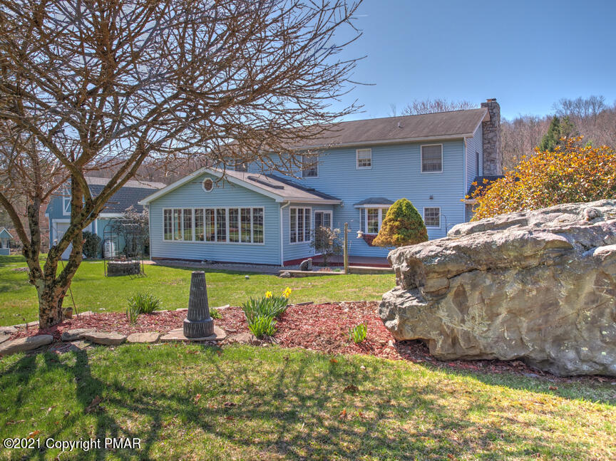 259 Babbling Brook Road Scotrun, PA 18355 - Photo 57 of 63 a front view of a house with garden