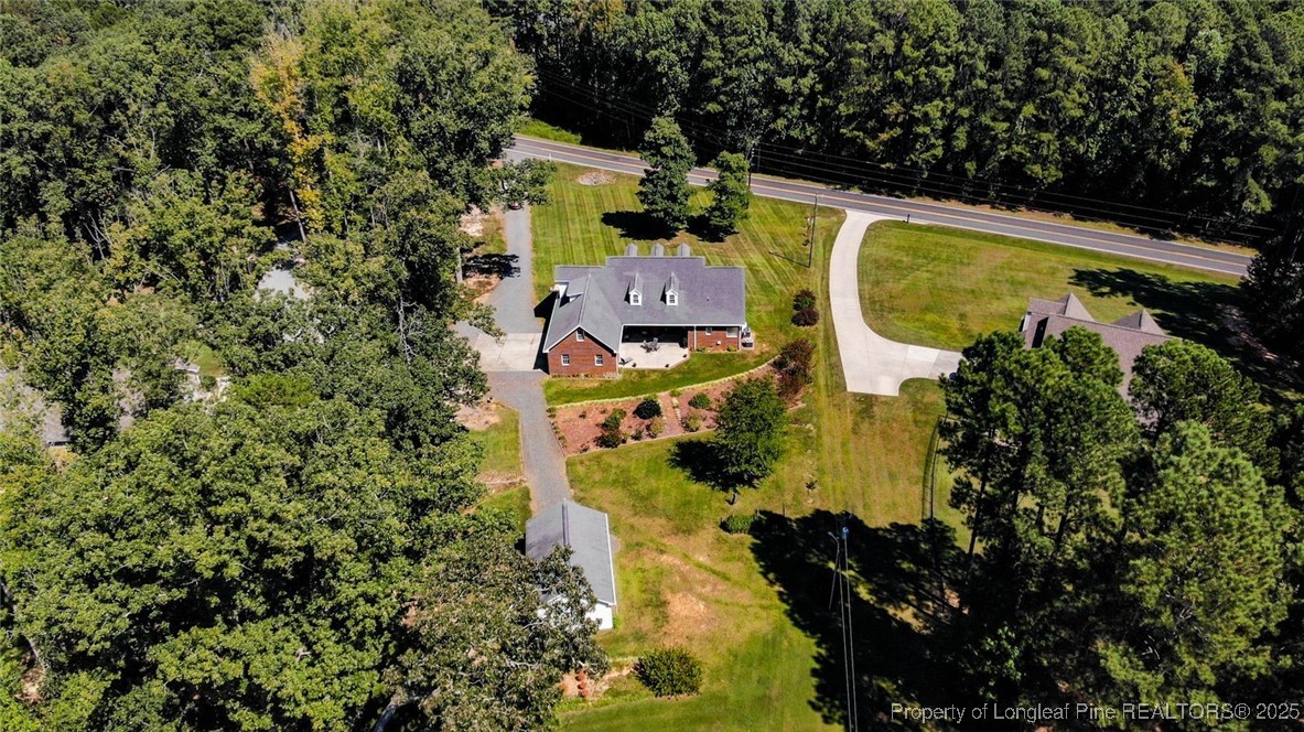 4635 Farrell Road Sanford, NC 27330 - Photo 2 of 30 an aerial view of a house with a swimming pool
