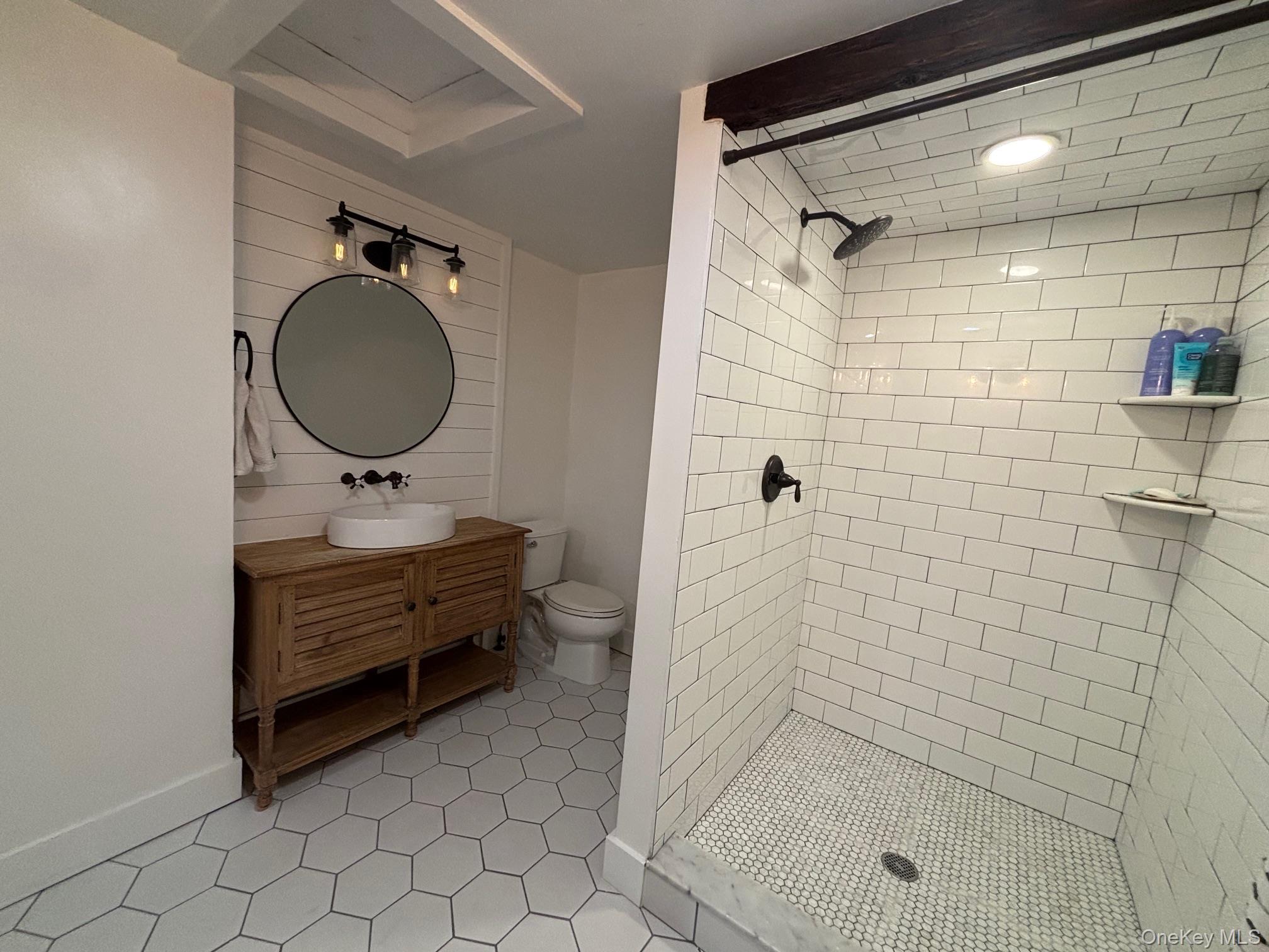 269 Old Rte 304 New City, NY 10956 - Photo 16 of 20 a bathroom with a sink mirror and shower