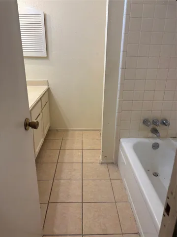 a bathroom with a bathtub