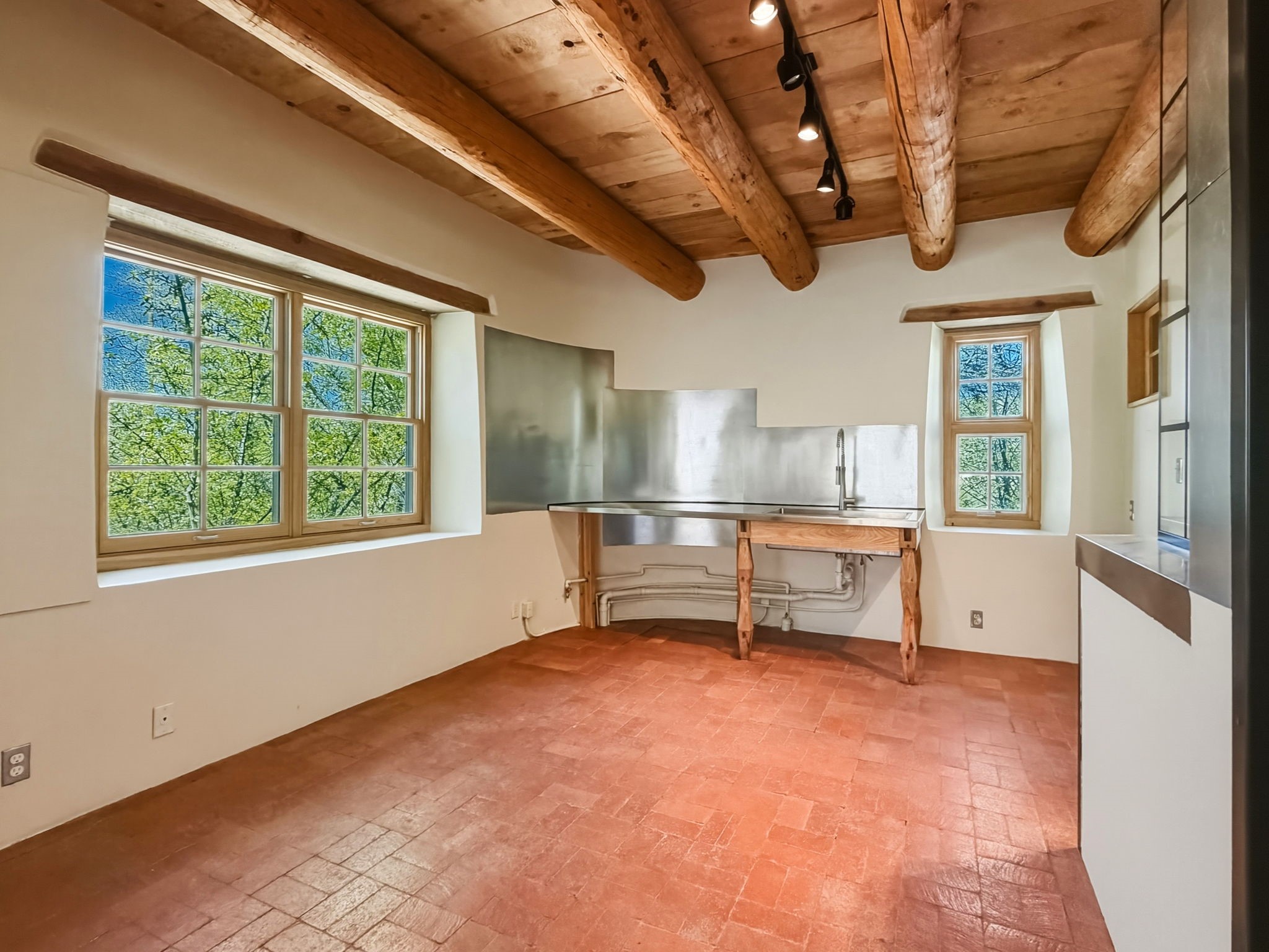 1692 Upper Canyon Road Santa Fe, NM 87501 - Photo 24 of 52 Versatile open-plan space with sink, ready to transform to suit your vision.