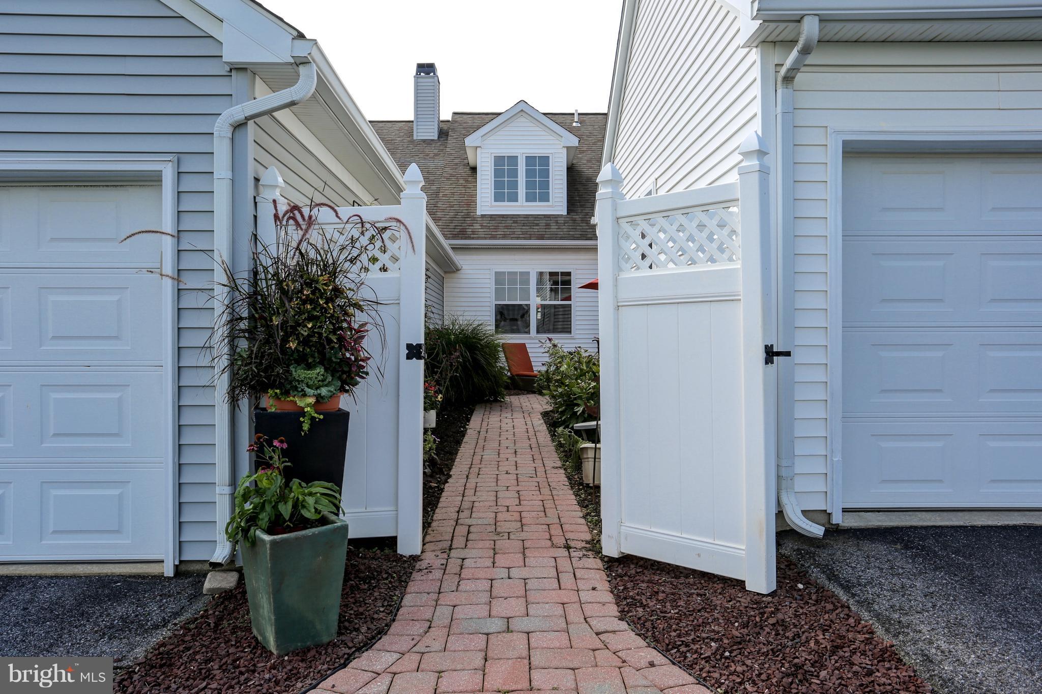 906 Suffolk Drive Lititz, PA 17543 - Photo 39 of 45 What a cheery entrance to the courtyard.