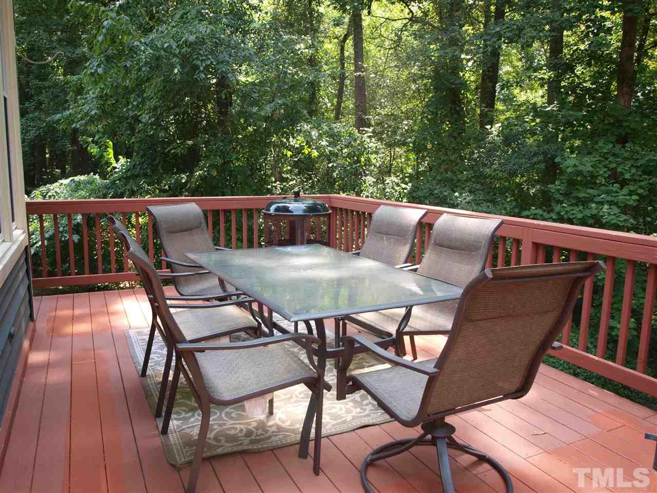 5729 Sentinel Drive Raleigh, NC 27609 - Photo 14 of 17 a view of balcony with furniture and stove