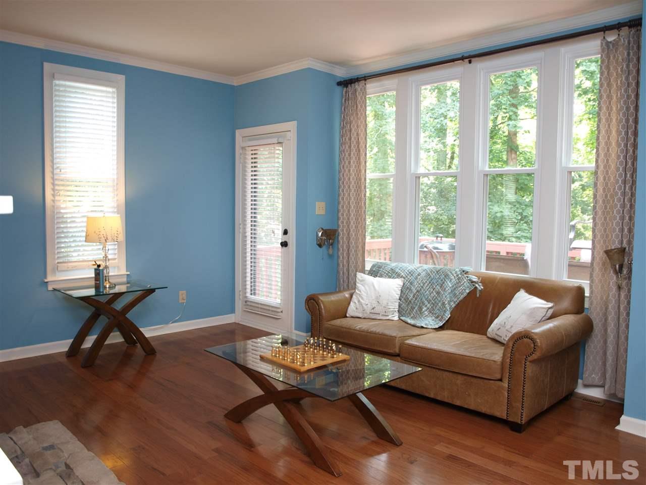 5729 Sentinel Drive Raleigh, NC 27609 - Photo 4 of 17 a living room with furniture and a window