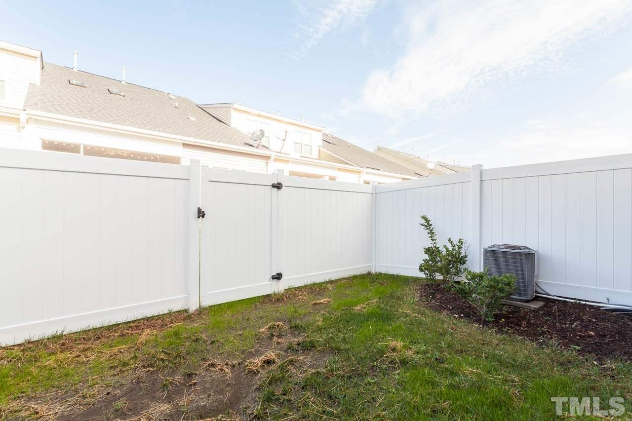7326 Caversham Way Raleigh, NC 27617 - Photo 12 of 23 a view of a backyard