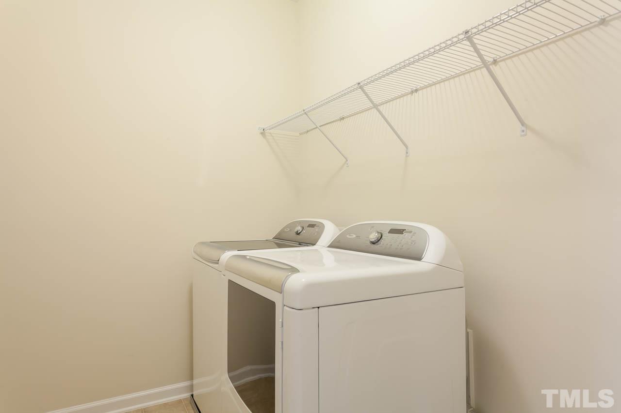7326 Caversham Way Raleigh, NC 27617 - Photo 22 of 23 a utility room with dryer and washer