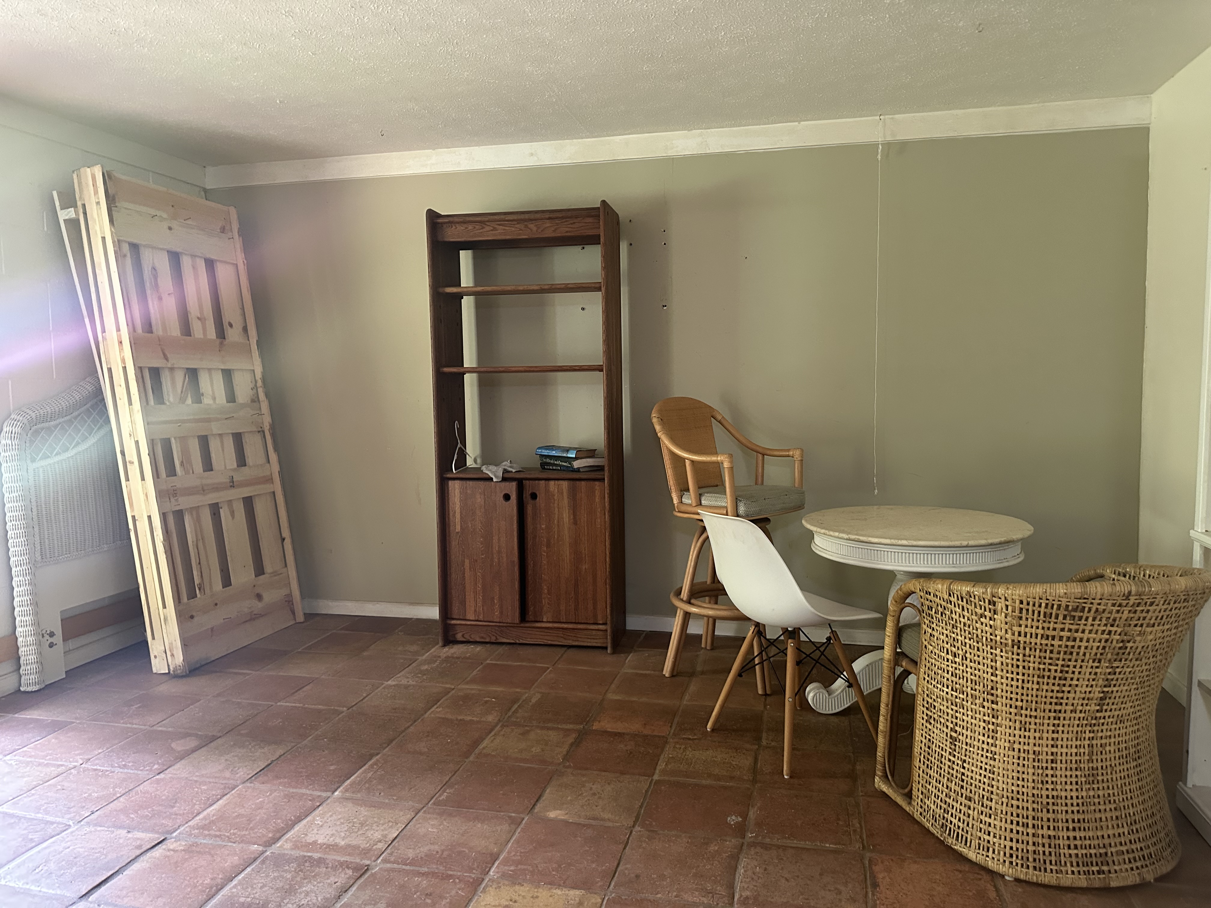 5404 Weke Road Hanalei, HI 96714 - Photo 16 of 19 a room with furniture and a window