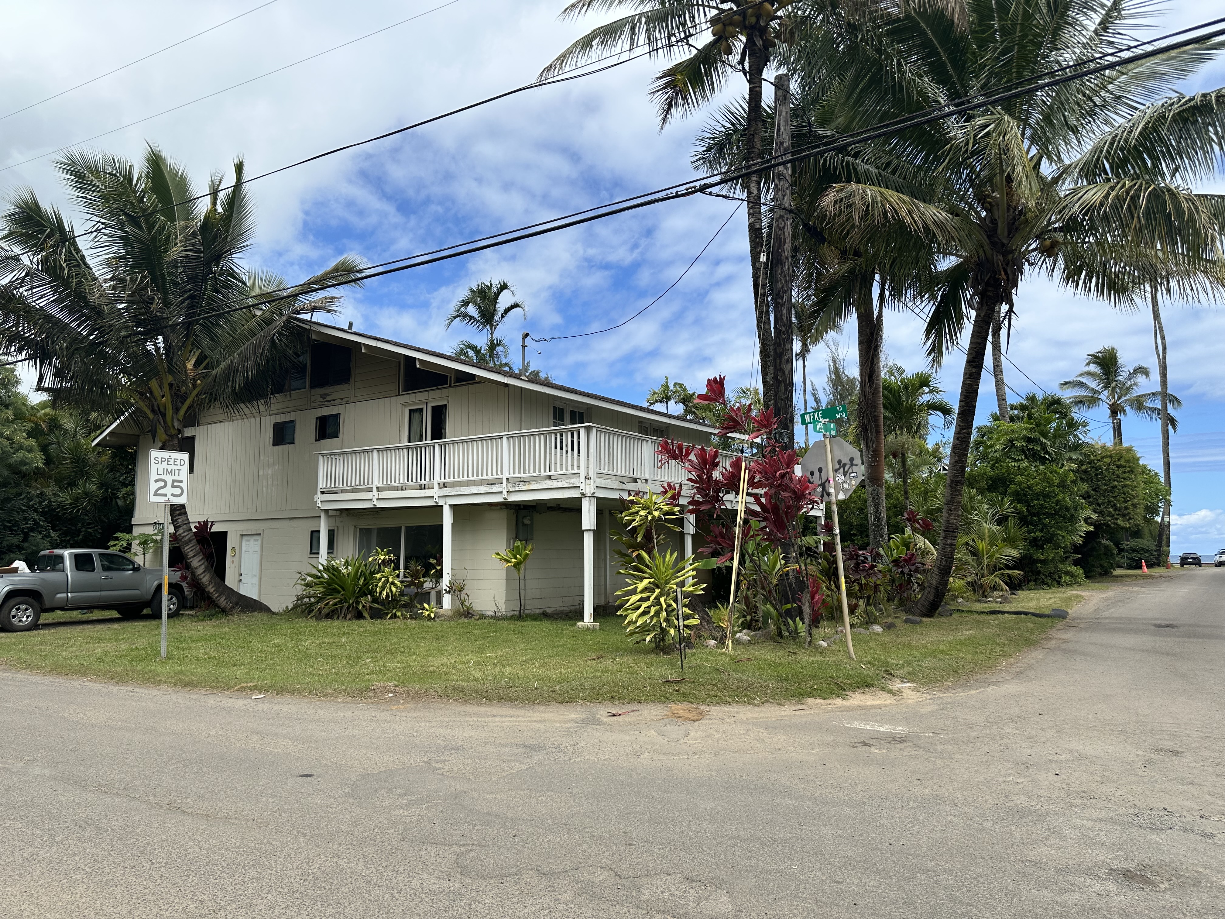 5404 Weke Road Hanalei, HI 96714 - Photo 2 of 19 a front view of a house with a yard