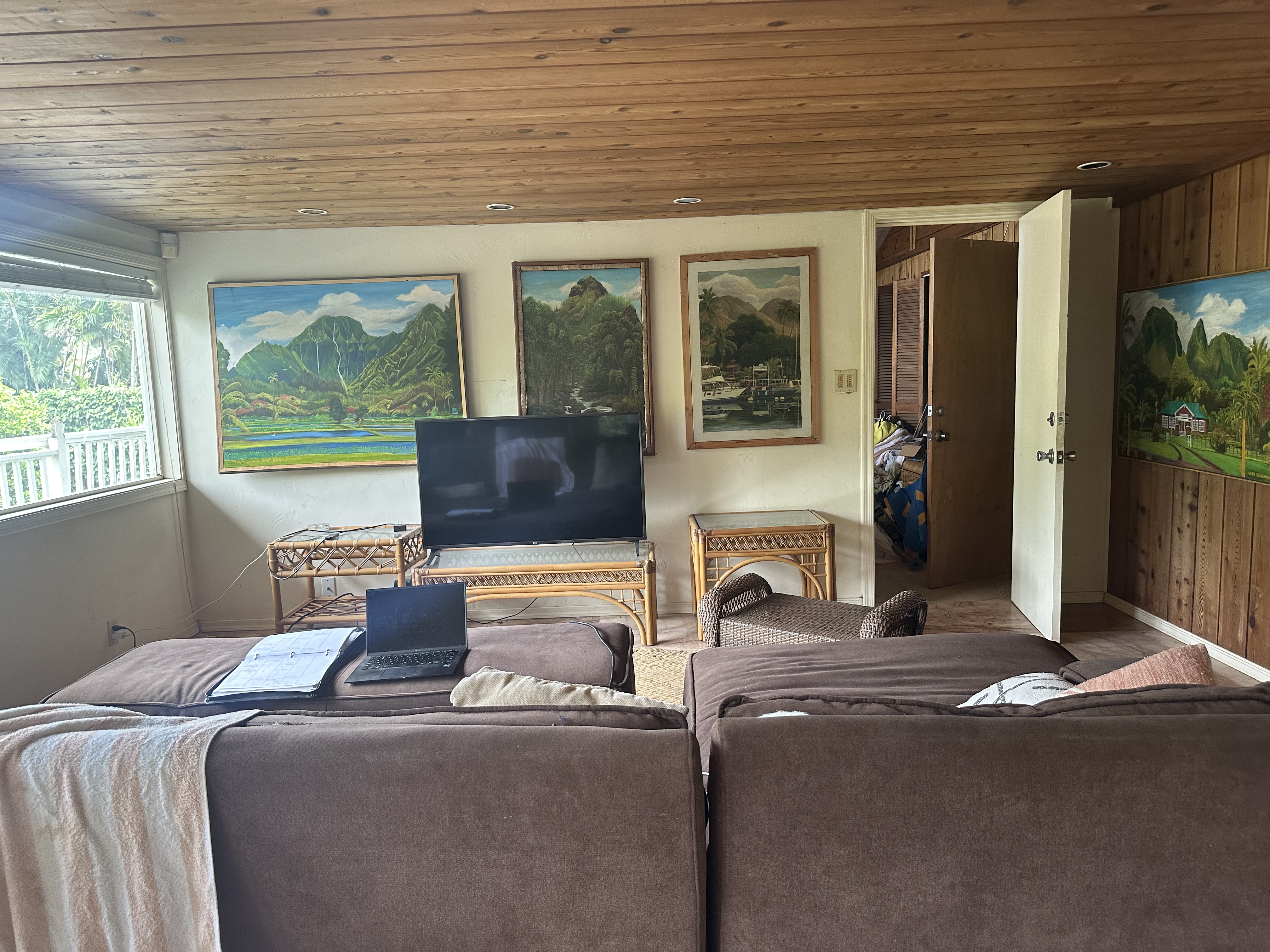 5404 Weke Road Hanalei, HI 96714 - Photo 4 of 19 a bedroom with furniture and large windows