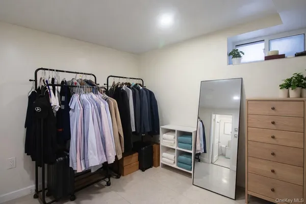 a bathroom with a shower and a sink