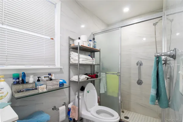 a view of hallway with wooden floor
