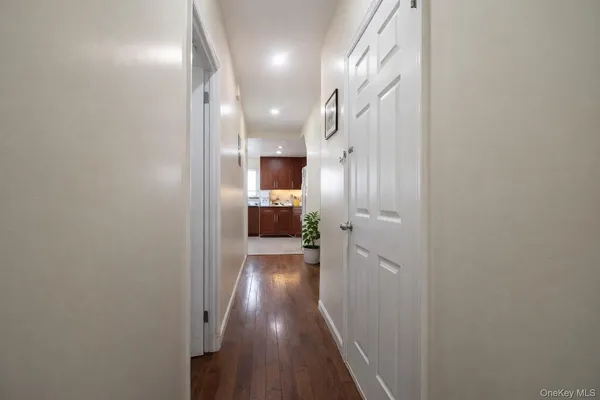 a kitchen with stainless steel appliances granite countertop a stove a sink dishwasher and a refrigerator
