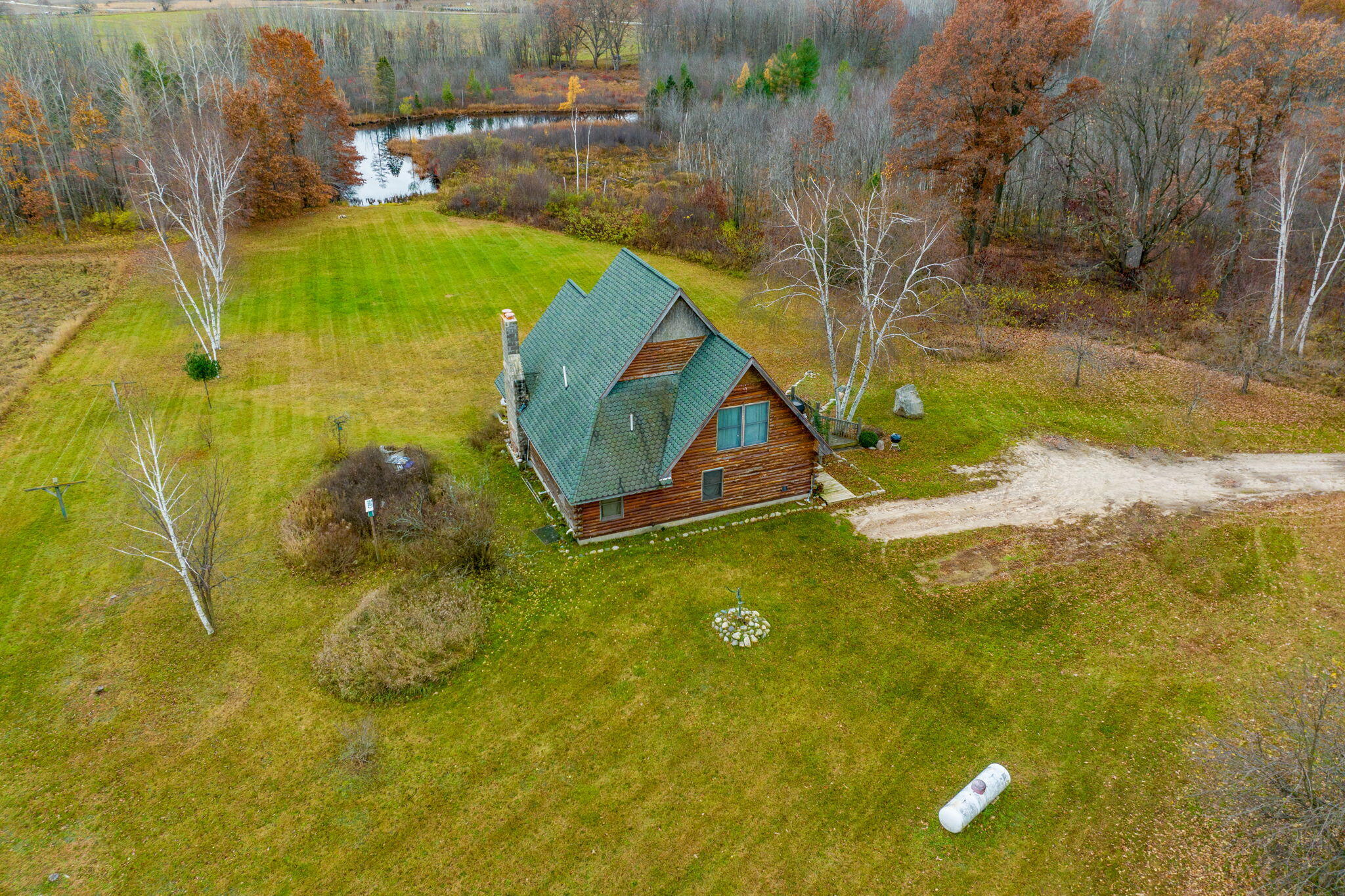 775 Jefferson Road Blanchard, MI 49310 - Photo 1 of 39 34-web-or-mls-DJI_0449-Edit