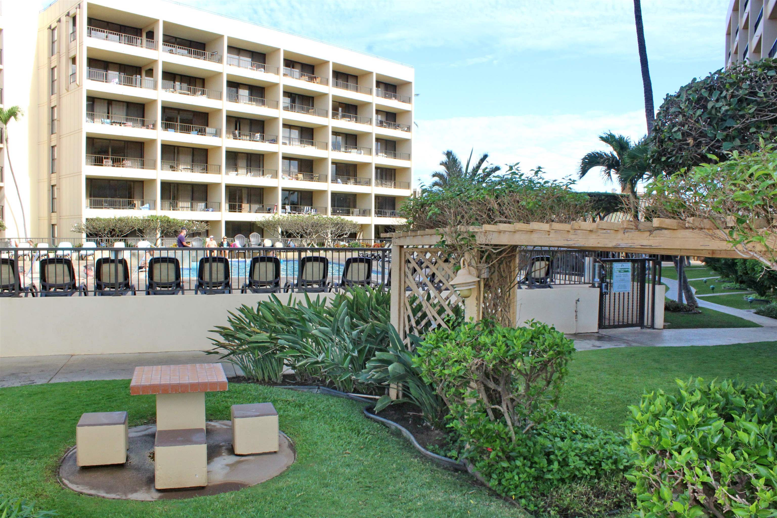 145 North Kihei Road, Unit 503 Kihei, HI 96753 - Photo 26 of 30 a front view of a house with a yard
