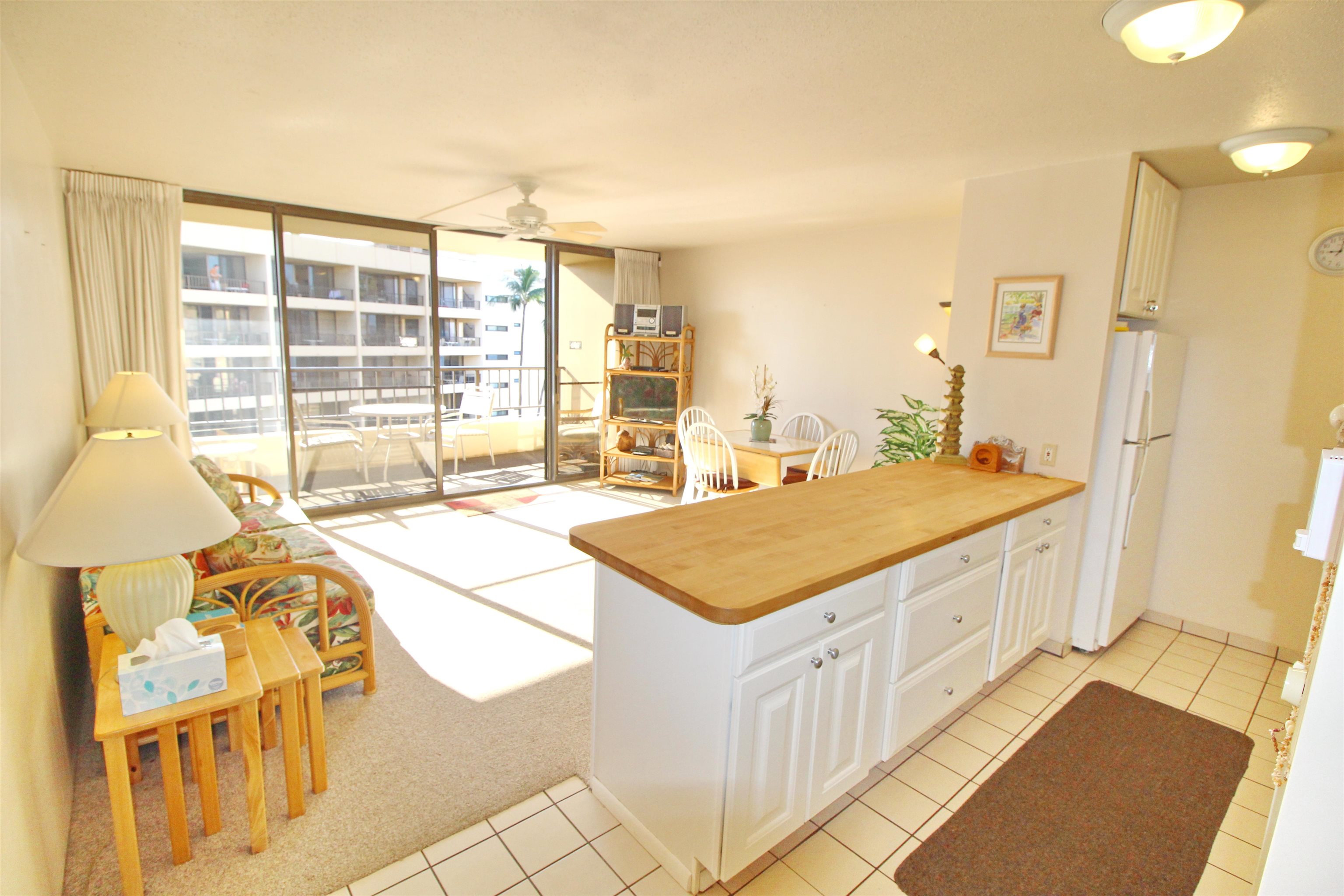145 North Kihei Road, Unit 503 Kihei, HI 96753 - Photo 7 of 30 a spacious bathroom with a granite countertop sink and a large mirror