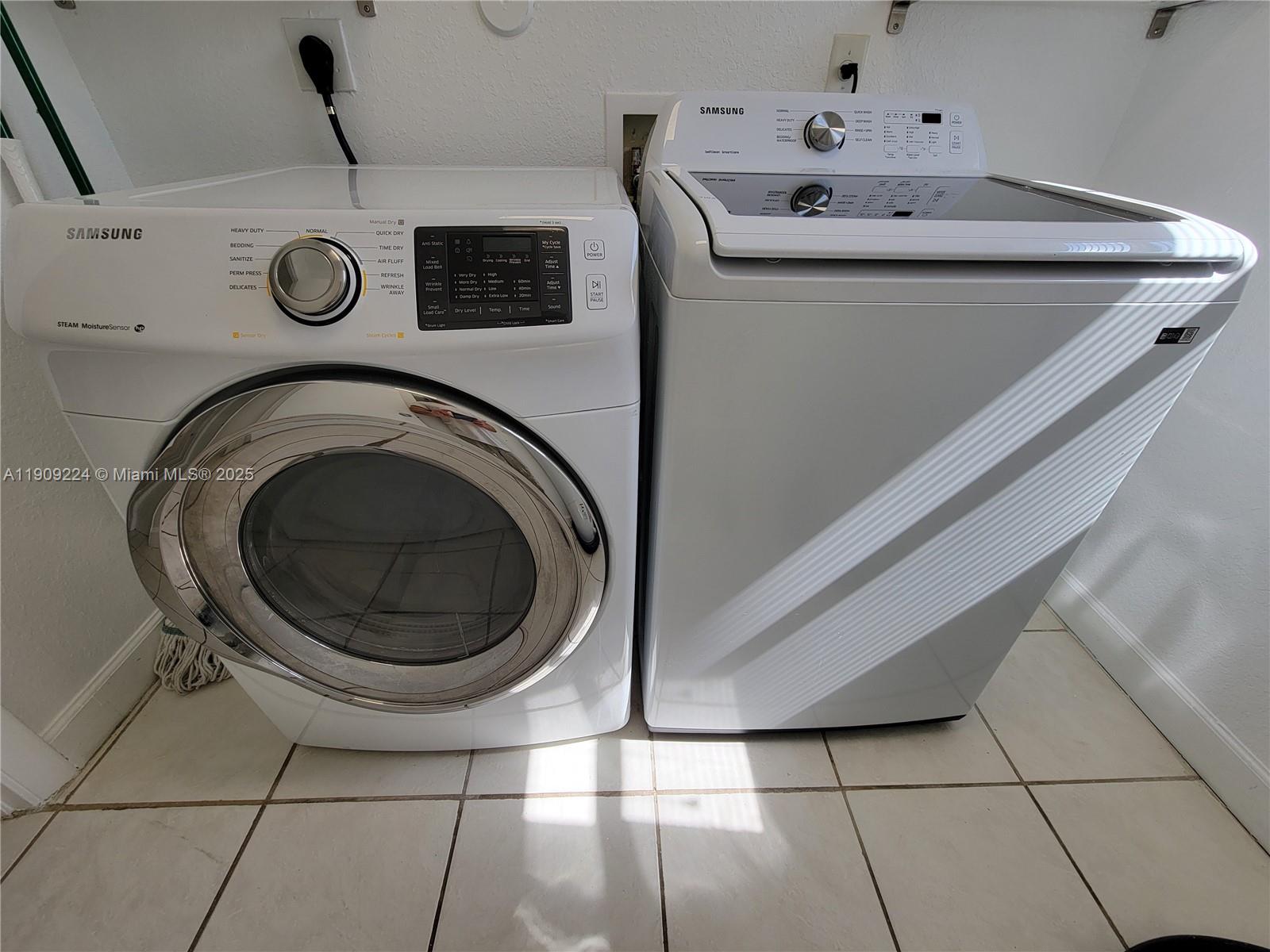 35 Southwest 7th Street, Unit 2 Hallandale Beach, FL 33009 - Photo 11 of 23 a utility room with dryer and washer